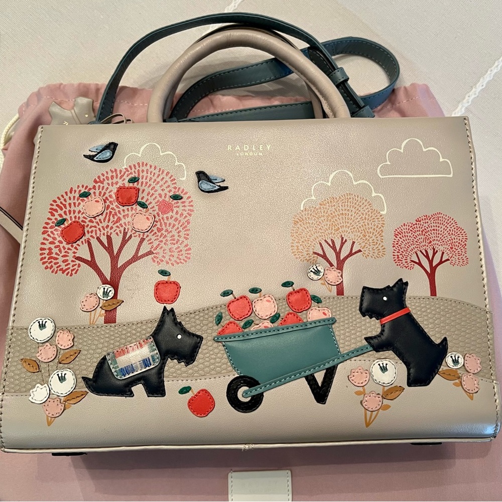 Radley London “To the Core” leather handbag.